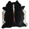 Brown and white cowhide rug XL